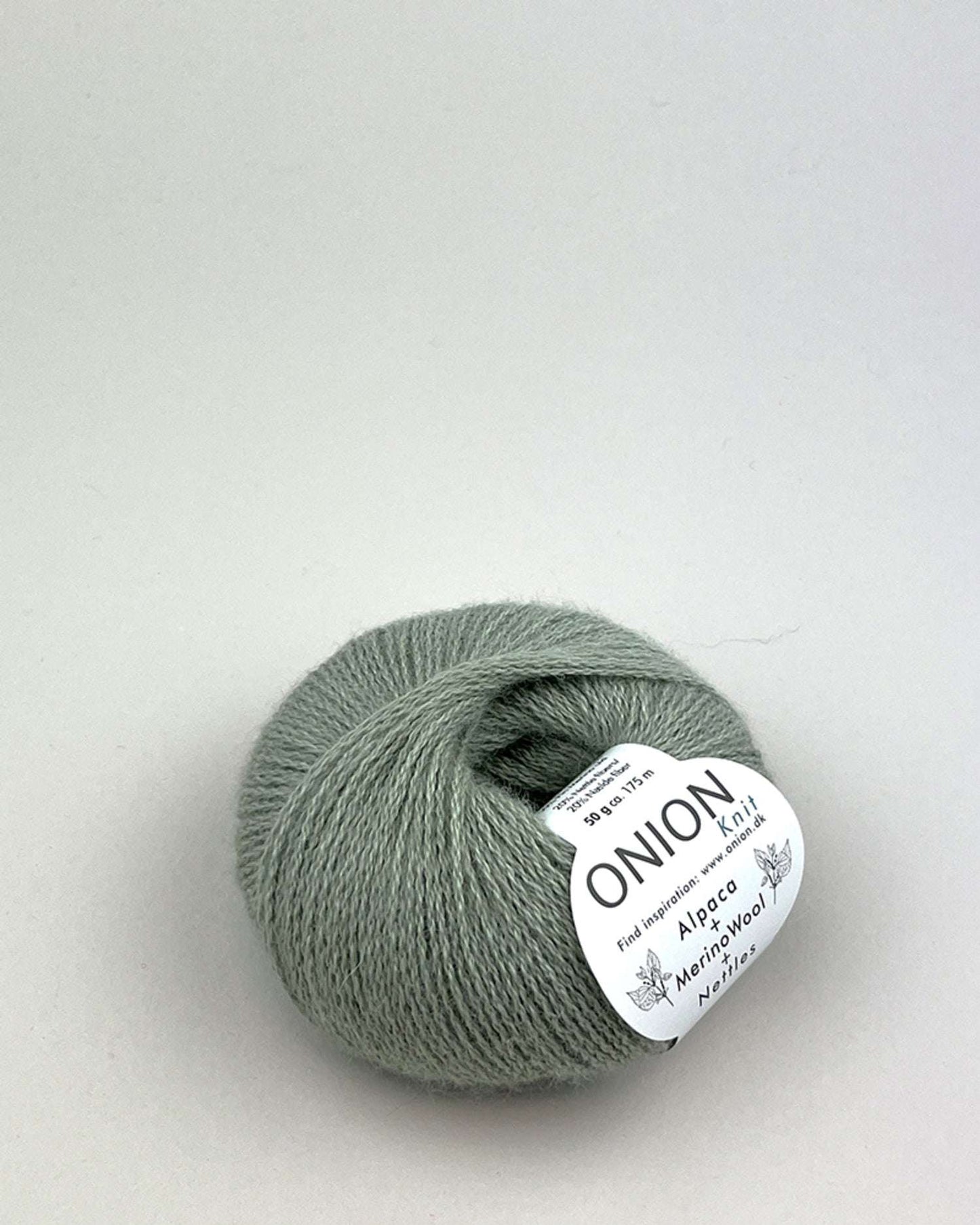 Garn til Den gode Cardigan kit i farven pastel green.