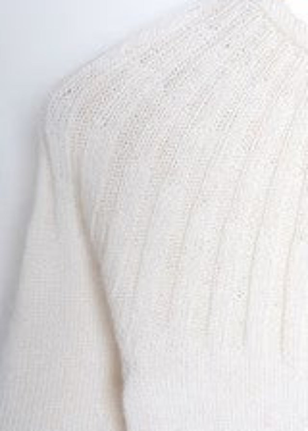 Petitknit sunday tee i Premium merino silk.