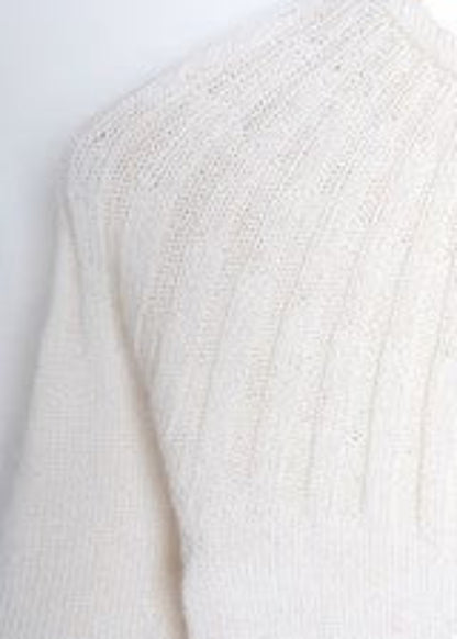 Petitknit sunday tee i Premium merino silk.